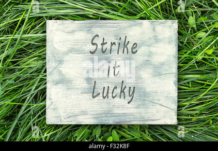 Hipster Vintage phrase motivation remarque, Strike It Lucky sign Banque D'Images