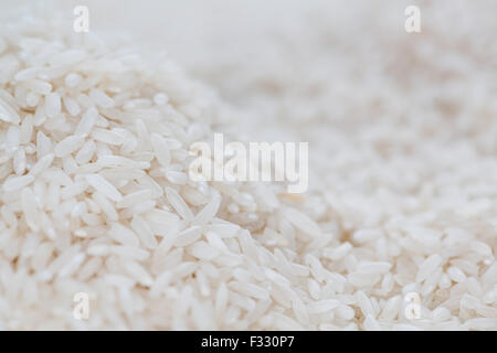 Gros plan du riz pour l'utiliser comme image de fond ou comme texture Banque D'Images