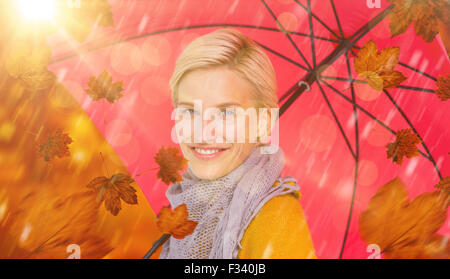 Portrait of woman holding an umbrella Banque D'Images