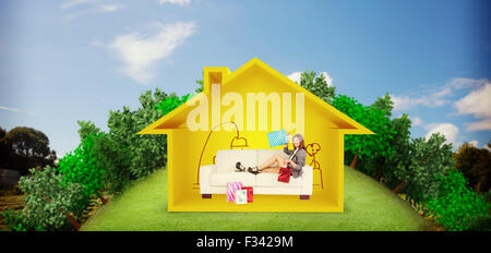 Image composite de woman lying on couch with shopping bags