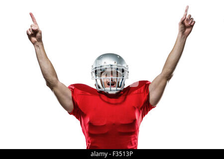 Joueur de football américain avec bras levés debout Banque D'Images