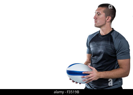 Joueur de Rugby en noir jersey holding ball Banque D'Images