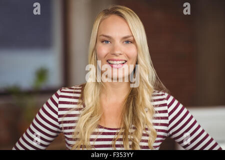 Portrait of cheerful businesswoman in office Banque D'Images