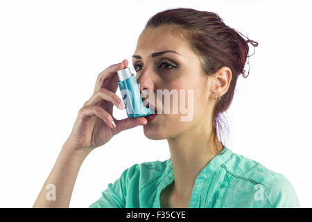 Close-up of woman using asthma inhaler Banque D'Images