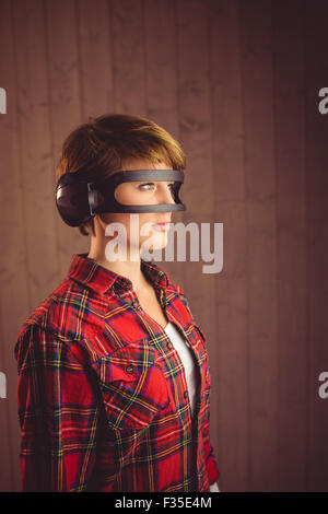 Pretty young woman wearing headphones Banque D'Images