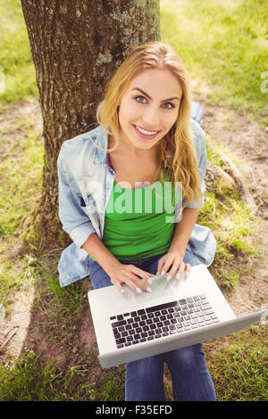 High angle portrait of woman using laptop Banque D'Images