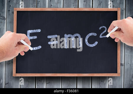 Image composite de l'homme d'affaires écrit à la craie Banque D'Images