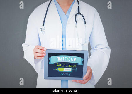 Image composite de doctor showing tablet pc Banque D'Images
