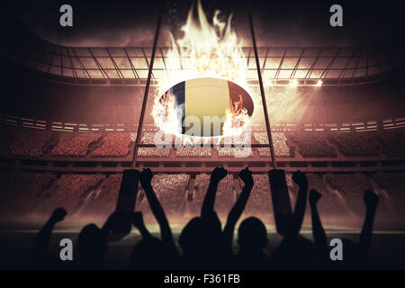 Image composite de silhouettes de supporters de football Banque D'Images