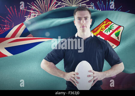 Image composite de rugby player with arms crossed Banque D'Images