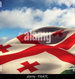 Image composite de close-up en agitant le drapeau de la Géorgie Banque D'Images