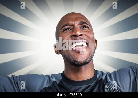 Image composite de close-up of cheerful sportsman Banque D'Images