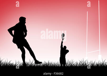 Image composite de rugby player faisant une passe latérale Banque D'Images