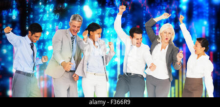 Image composite des gens d'affaires cheering in office Banque D'Images