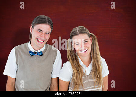 Composite image of geeky hipsters looking at camera Banque D'Images