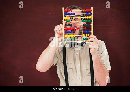 Image composite de hipster geek holding un boulier Banque D'Images