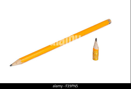 Long et court orange pencils isolated on white background Banque D'Images