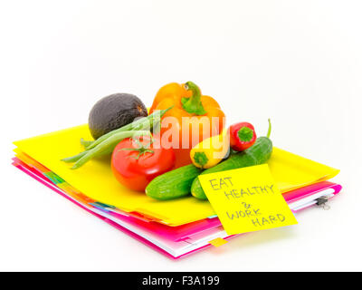 Présenter des légumes et des messages pour careing travail dur. Banque D'Images