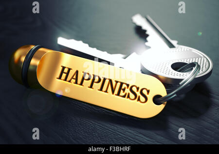 Clés du bonheur - Notion sur le Trousseau d'or sur fond de bois noir. Vue rapprochée, Selective Focus, 3D Render. Ima tonique Banque D'Images