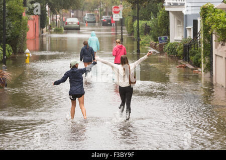 Girls Play In The A Street Flooded By The Rising Rio Solimoes One Of The Two Main Branches Of The Amazon River In Anama 160 Km 100 Miles West Of Manaus May