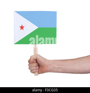 Main tenant petite carte, isolé sur blanc - Pavillon de Djibouti Banque D'Images
