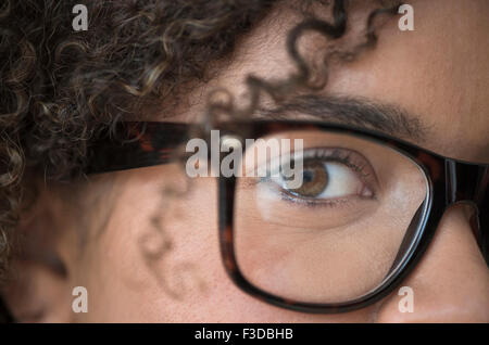 Close up of young woman in lunettes nerdy Banque D'Images