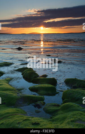 Coucher du soleil à Les Sables d'Mussetter sur l'île d'Eday, îles Orcades, en Écosse. Banque D'Images