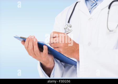 Image composite de doctor writing on clipboard Banque D'Images