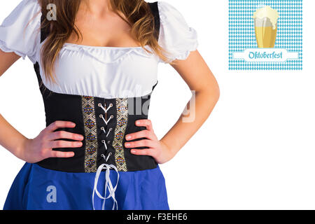 Image composite de l'Oktoberfest Girl standing with hands on hips Banque D'Images