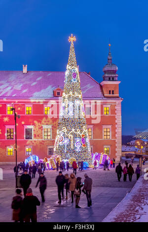 Illumination de Noël de la Place du Château, le Château Royal et l'arbre de Noël dans la vieille ville de Varsovie, Pologne Banque D'Images