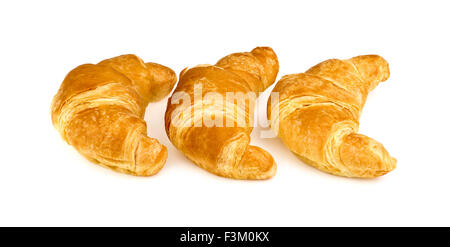 Trois croissant au beurre isolé sur fond blanc Banque D'Images