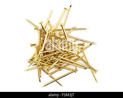 Tas de clous d'or Banque D'Images