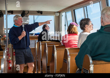 Tourguide et les touristes sur les sites touristiques voile ; Jackson Lake, Grand Teton National Park, Wyoming, USA Banque D'Images
