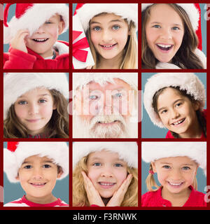 Image composite de santa smiling at camera Banque D'Images