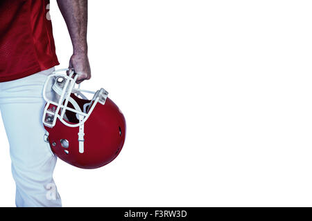 Portrait rugby player holding helmet Banque D'Images