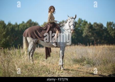 Belle fille équitation Banque D'Images