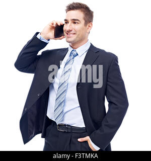 Caucasian businessman talking on cellphone Banque D'Images