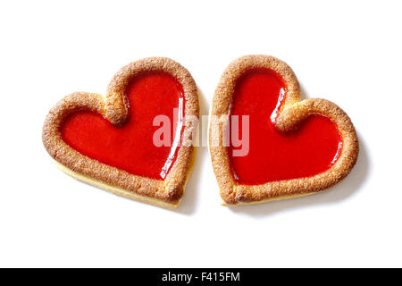 Deux coeurs battant ensemble biscuit rouge sur fond blanc Banque D'Images