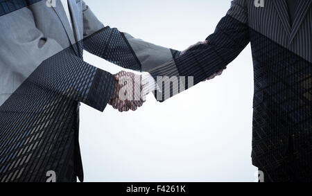 Image composite de handshake en accord Banque D'Images