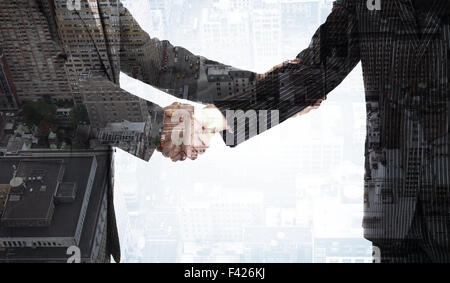 Image composite de handshake en accord Banque D'Images