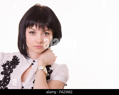 Portrait d'une jeune fille en blouse blanche Banque D'Images