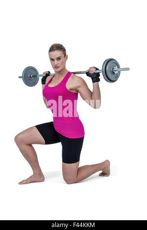 Barebell levage sportive femme bodybuilder Banque D'Images