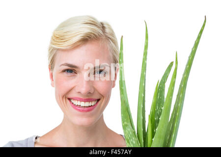 Attractive Woman holding aloe vera Banque D'Images