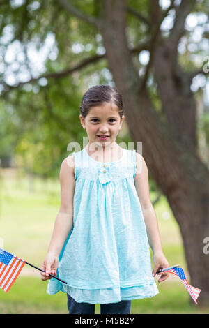 Little girl waving american flag Banque D'Images