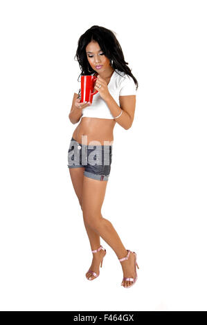 Girl with red cup. Banque D'Images