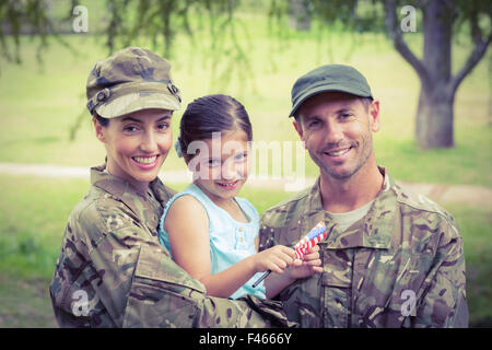 Les parents de l'armée réunis avec leur fille Banque D'Images