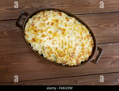 Bacalhau com natas - poisson en sauce avec des pommes de terre. Une cuisine portugaise Banque D'Images