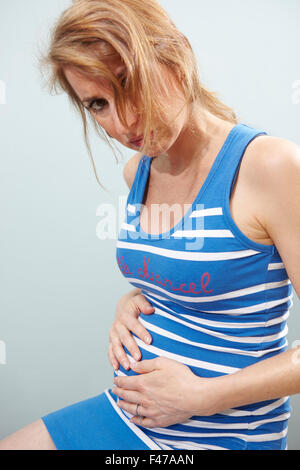 Femme enceinte DANS LA DOULEUR Banque D'Images