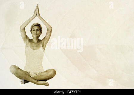 Image composite de fit woman doing yoga Banque D'Images