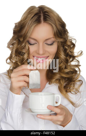 Femme avec un sachet de thé a l'air en tasse Banque D'Images